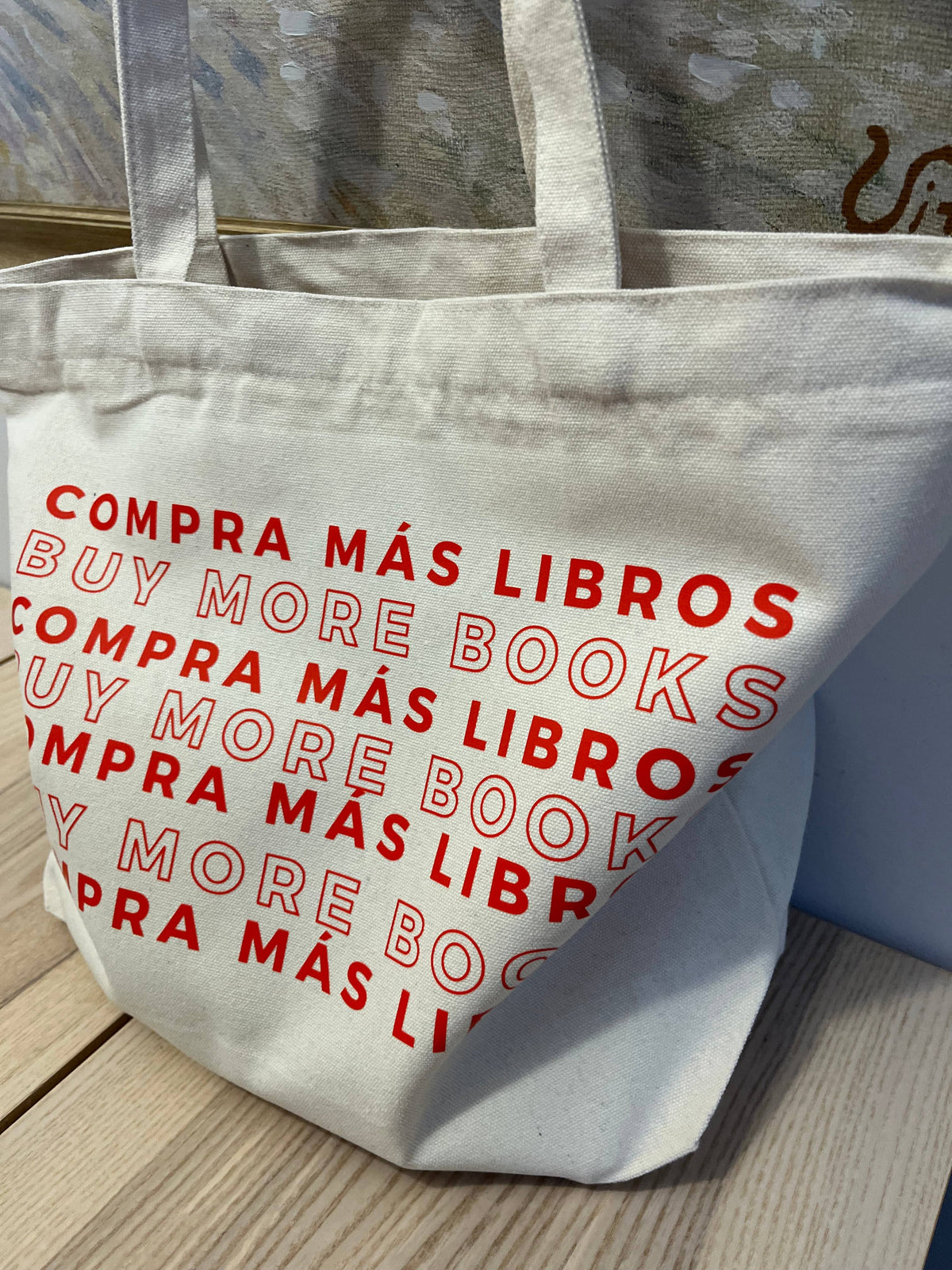 "Buy more books” zipper tote bag 